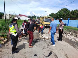 Dipasangi Plat Baja Jalan Amblas di Simpang Panei Bisa Dilintasi